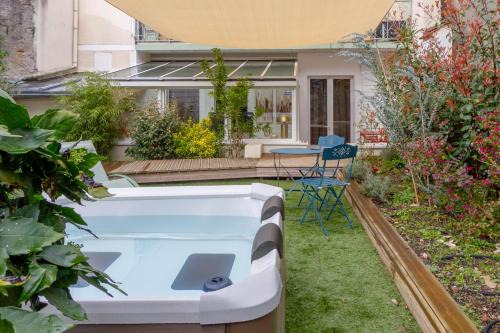 Centre Ville Apartment | Le Bucolique - T3 avec jacuzzi, véranda et jardin