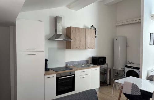 Sauxillanges Apartment | 4-bed family apartment with hanging net and arcade terminal