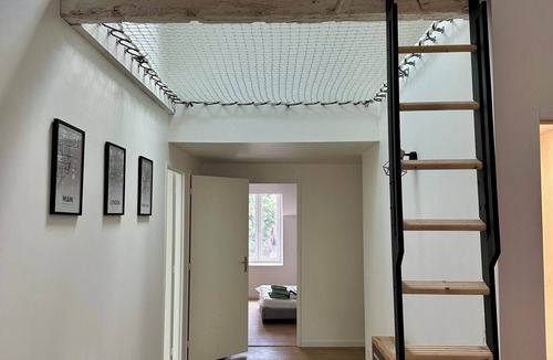 Sauxillanges Apartment | 4-bed family apartment with hanging net and arcade terminal