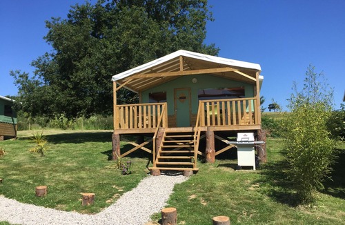 Henansal Cabin | A two bedroom luxury lodge with extra cabin beds, heated covered pool
