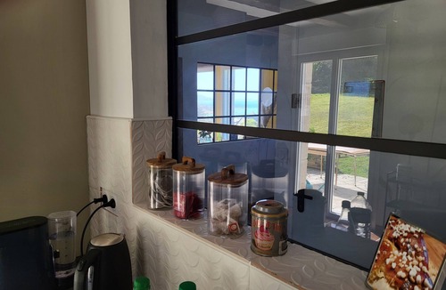 Trelevern House | Brittany holiday home sea view, conservatory, sleeps 8 near beach prime location