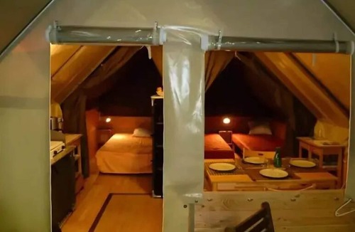 Marcillac-Saint-Quentin House | Camping Le Pont de Mazerat **** - La Cabane Toilée: Camping in half tent, half cabin accommodation! 5 people