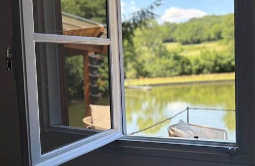 Manzat Ski Chalet | Chalet and pond, exclusively for your private use.