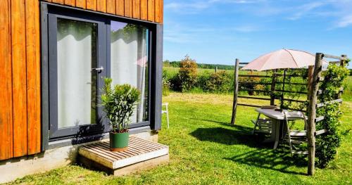 Bussy-le-Repos Ski Chalet | Chalet moderne avec grandes baies vitrées et espace plancha