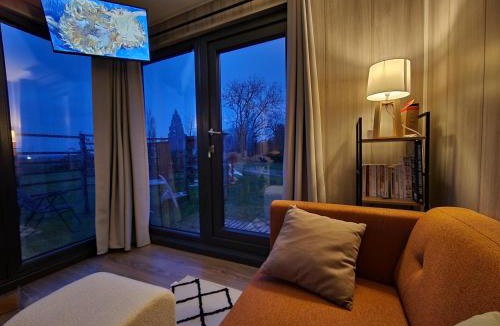 Bussy-le-Repos Ski Chalet | Chalet moderne avec grandes baies vitrées et espace plancha