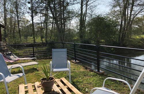 Mezieres-sur-Ponthouin Cottage | Cottage by Orne River with garden and fishing, Pets allowed