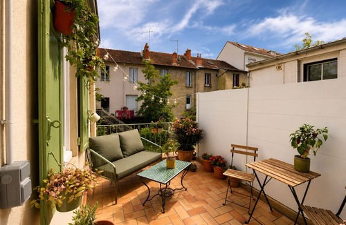 Vichy Apartment | Green Shutters Terrace, Art, and the Good Life