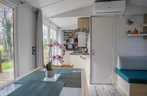 Carnac RV Rental | Mobile Home 'Au Petit Bonheur' with Shared Pool, Private Terrace and Private Garden
