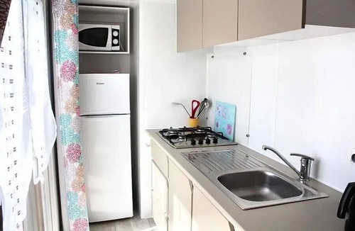 Ravenoville House | Mobile Home | Comfort | 3 Bedrooms | 6 guests | Raised, uncovered patio | TV