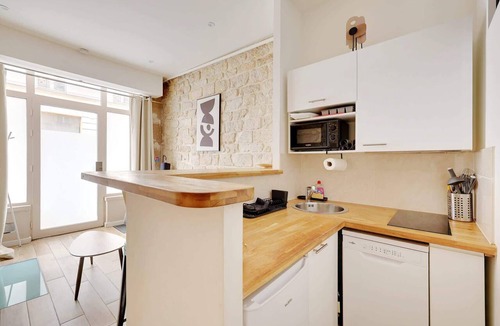 Quartier de la Porte-Saint-Denis Apartment | Paris Hideaway: Private Cinema – GetHosted