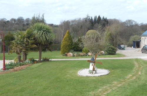 Brix House | Pretty stone house with large flowery grounds, open and green view
