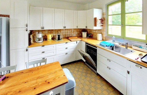 La Ferte-Saint-Aubin House | Relax in this historic and characterful holiday home with shared pool.