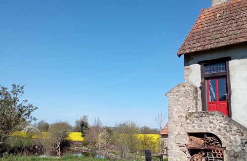 Parsac House | rural cottage with garden overlooking the swimming pond