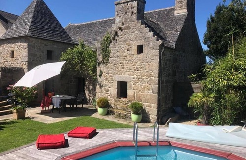 Cleder House | Small manoir fireplace private pool courtyard