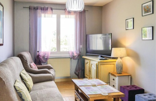 Chef-du-Pont House | This large house is tastefully decorated and has a large living room with an open fireplace.