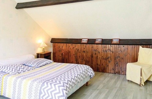 Chef-du-Pont House | This large house is tastefully decorated and has a large living room with an open fireplace.
