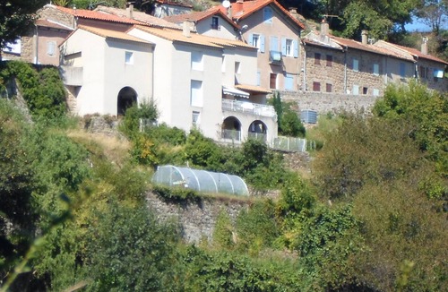 Saint-Pierreville House | Traditional blue-shuttered stone house in a stunning Ardeche mountain village.