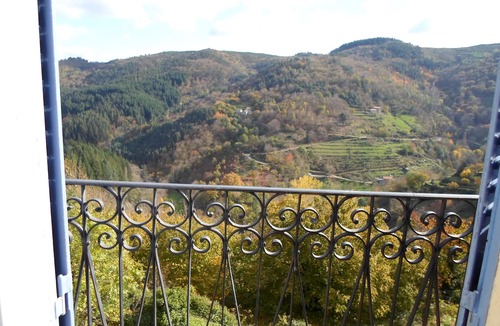 Saint-Pierreville House | Traditional blue-shuttered stone house in a stunning Ardeche mountain village.