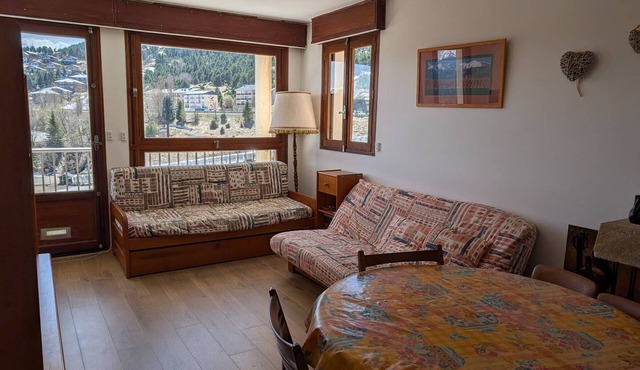2-room apartment with south-facing balcony and private parking