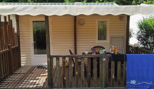 Air-conditioned 2-bedroom mobile home with television sleeps 4
