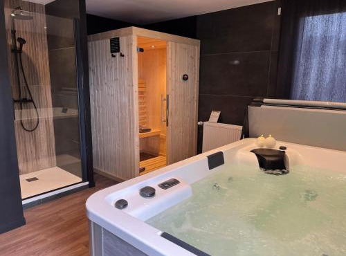 Appartement Volupté - Jacuzzi & Sauna - Luxe & Intimité