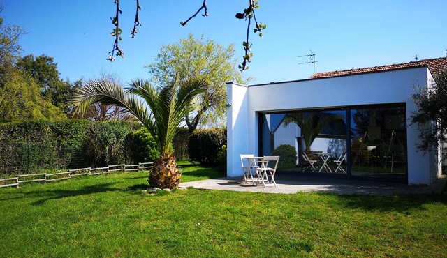 Bright house between port and beach