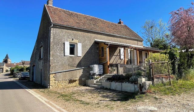 Charming burgundy farmhouse