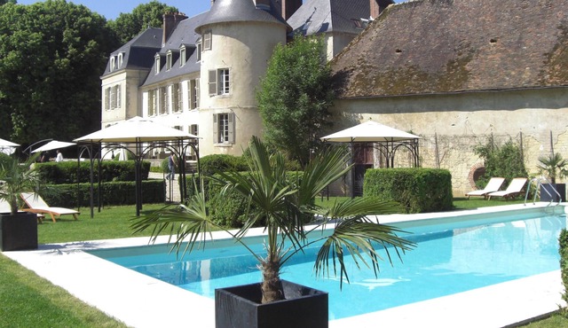 Chateau life, chic and bucolic with swimming pool in a large private park.