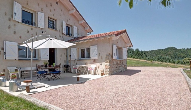 Cozy cottage with terrace, garden and fireplace in Saint-Priest-la-Prugne