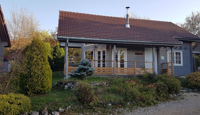 .finnish chalet with sauna entrance to haut jura nature park, open countryside