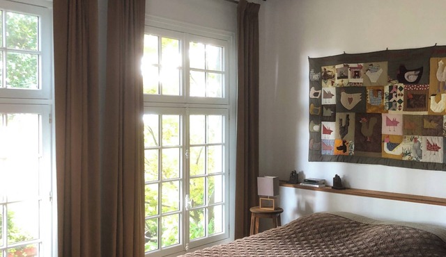 Loft-style apartment in a former orangery.