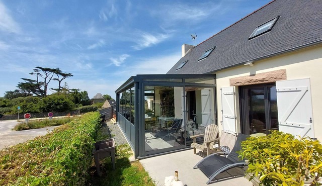 Maison vue mer véranda terrasse et jardin