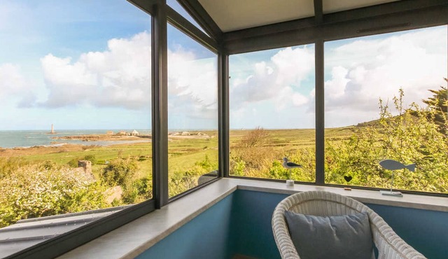 Seaside House with Fireplace and Flowered Garden