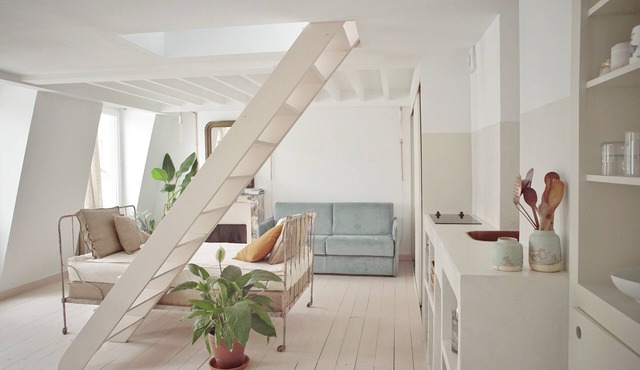 Summer light: architect’s nest between rooftops