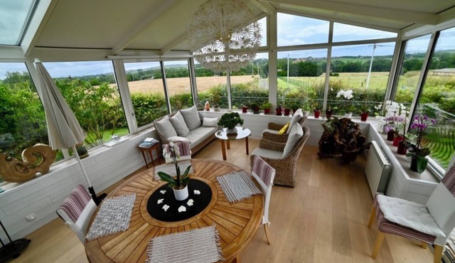 The tranquility of a countryside setting near the sea.