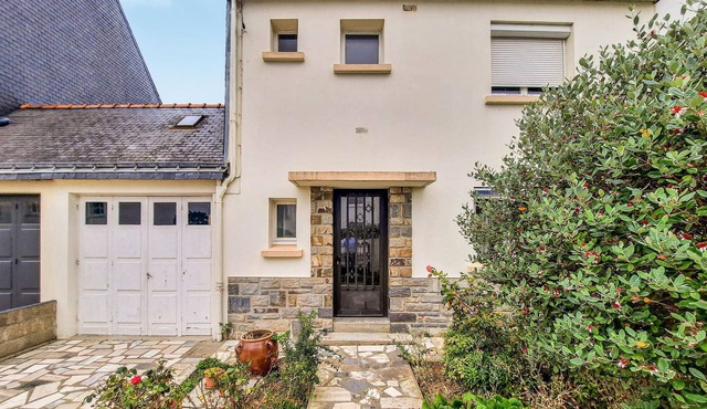 Vacation in classic French terraced house overlooking the water.